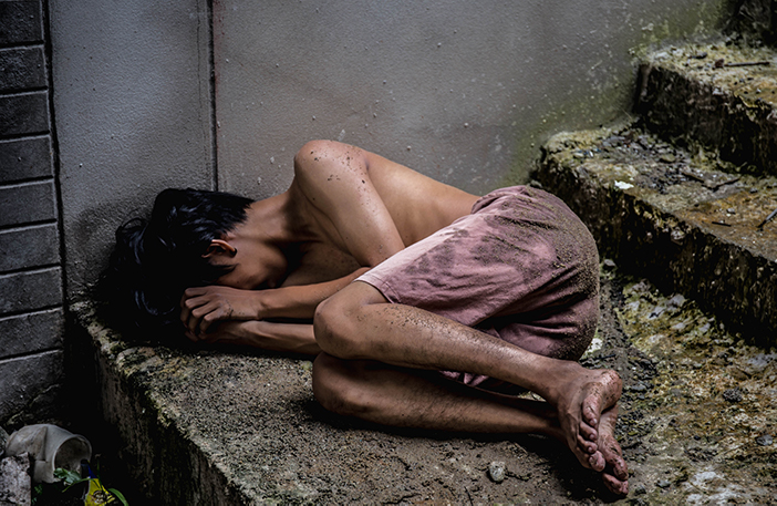 Photo of a child crouching